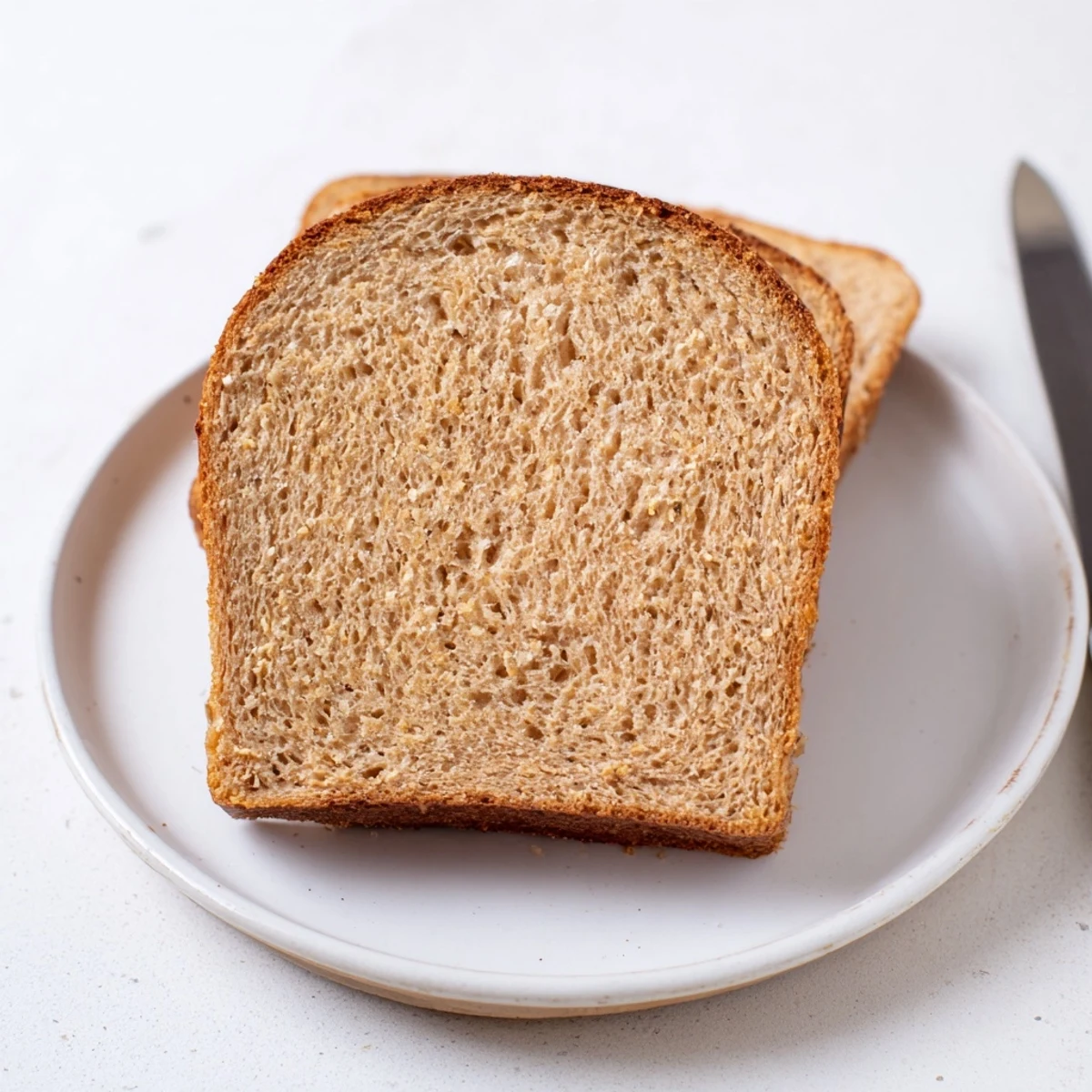 Soft and fluffy Easy Whole Wheat Sandwich Bread, ideal for toast and hearty sandwiches.  