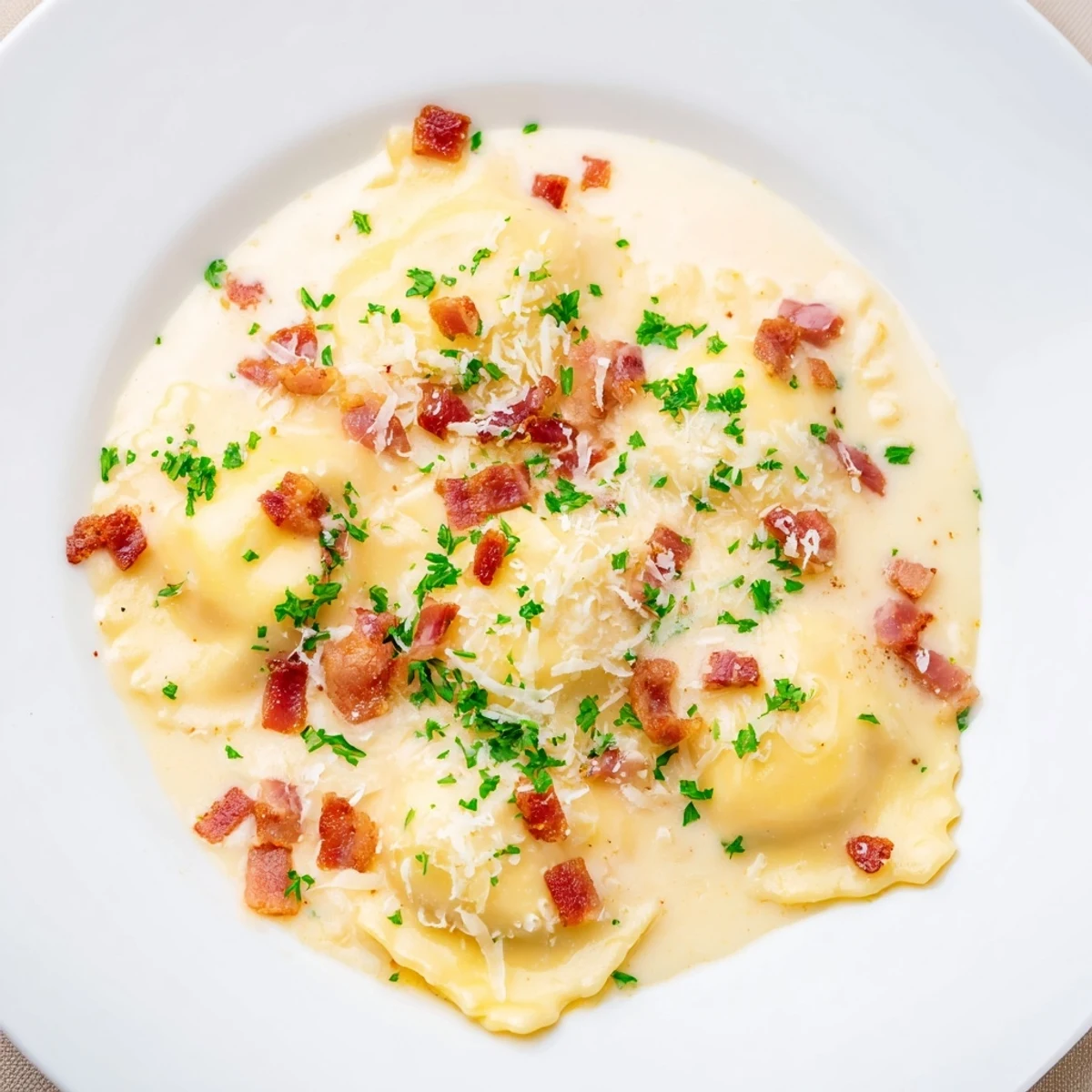 Creamy Olive Garden Ravioli Carbonara with crispy pancetta, Parmesan, and fresh parsley; a comforting Italian dinner.