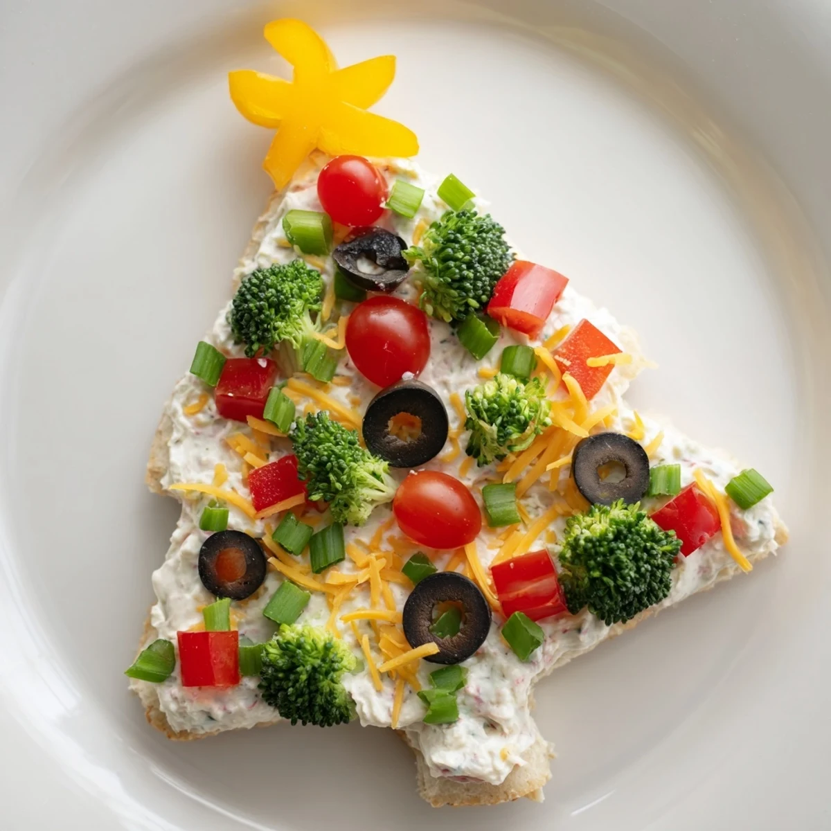 Vibrant Easy Christmas Tree Veggie Pizza, festively decorated with fresh veggies, ready for a holiday party.