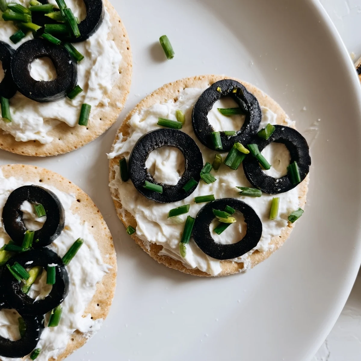 Freshly made Gold Medal Olympic Ring Appetizers with vibrant toppings, ready to enjoy at a party.