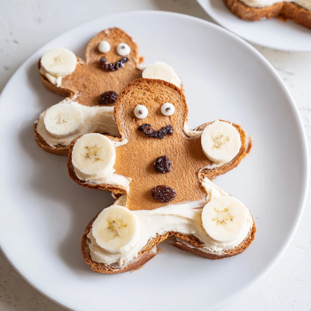 Sweet cream cheese filling oozes from these whimsical Gingerbread Man Sandwich cutouts, ready to eat now!