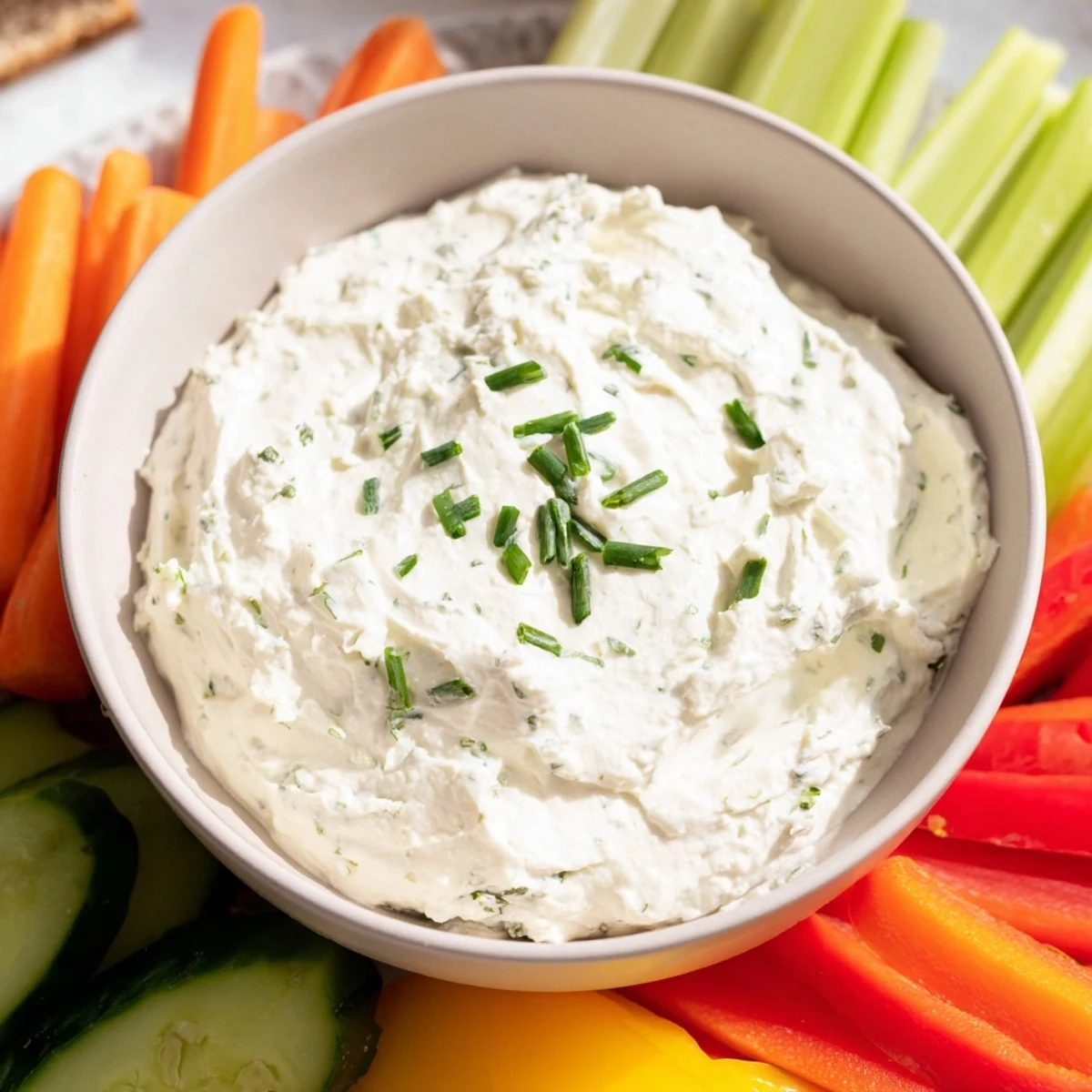 Homemade Kids Dip, served with vibrant, colorful veggie sticks, ready for dipping and fun snacking.