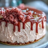 Blush pink Rosé Velvet Cake, drizzled with enticing gold for a festive touch.