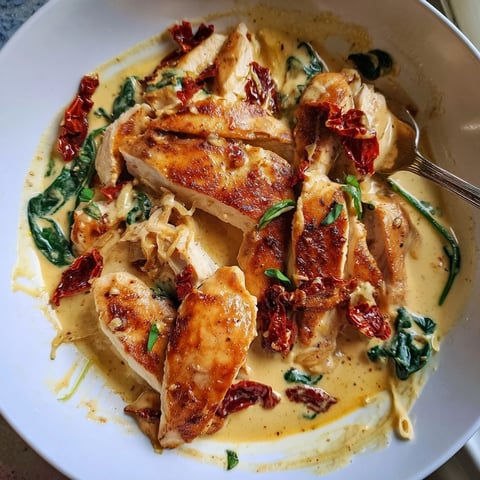 Tender One-Pan Creamy Tuscan Chicken in rich garlic-parmesan sauce with vibrant spinach.