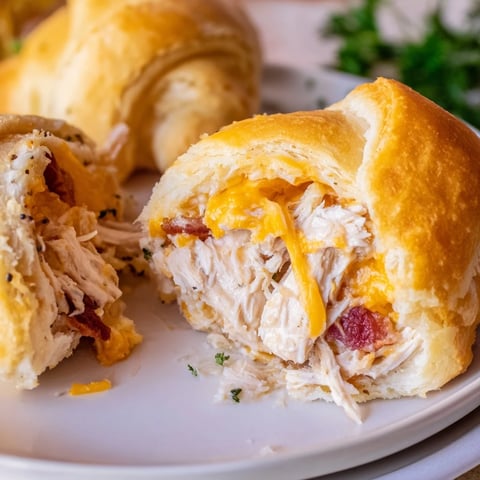 Golden-brown Cheesy Chicken and Bacon Crescent Rolls, a savory appetizer baked to perfection.