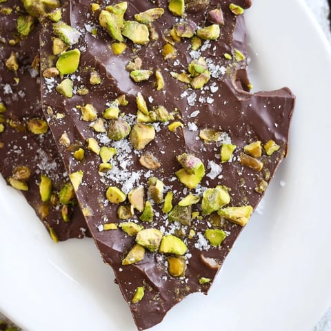 Golden caramel swirls on rich chocolate with crunchy pistachios atop the Pistachio Salted Caramel Bark.