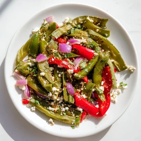 Freshly cooked Desert Cactus Taco Platter, offering a tantalizing mix of flavors and textures alongside lime wedges.