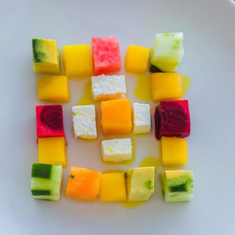 Crisp, colorful Cube Geometry Study salad, perfect for a refreshing appetizer with feta cubes.