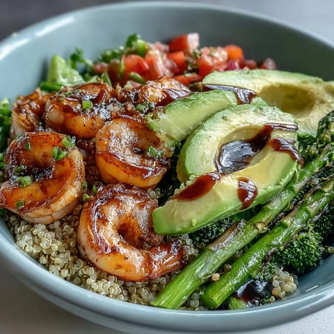 Vivid red cabbage and creamy avocado slices create a colorful presentation of the Rainbow Vegetable Detox Bowl.